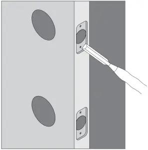 Use chisel and hammer to create mortise for latch and bolt