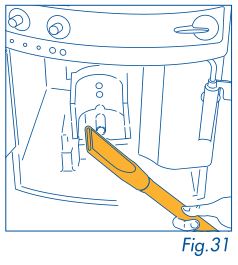 DeLonghi Magnifica - pick up all the residues using a vacuum cleaner